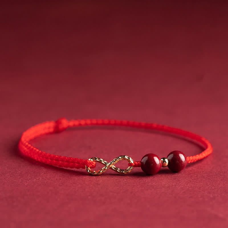 Armband Rotes Band Gold Infinity Symbol
