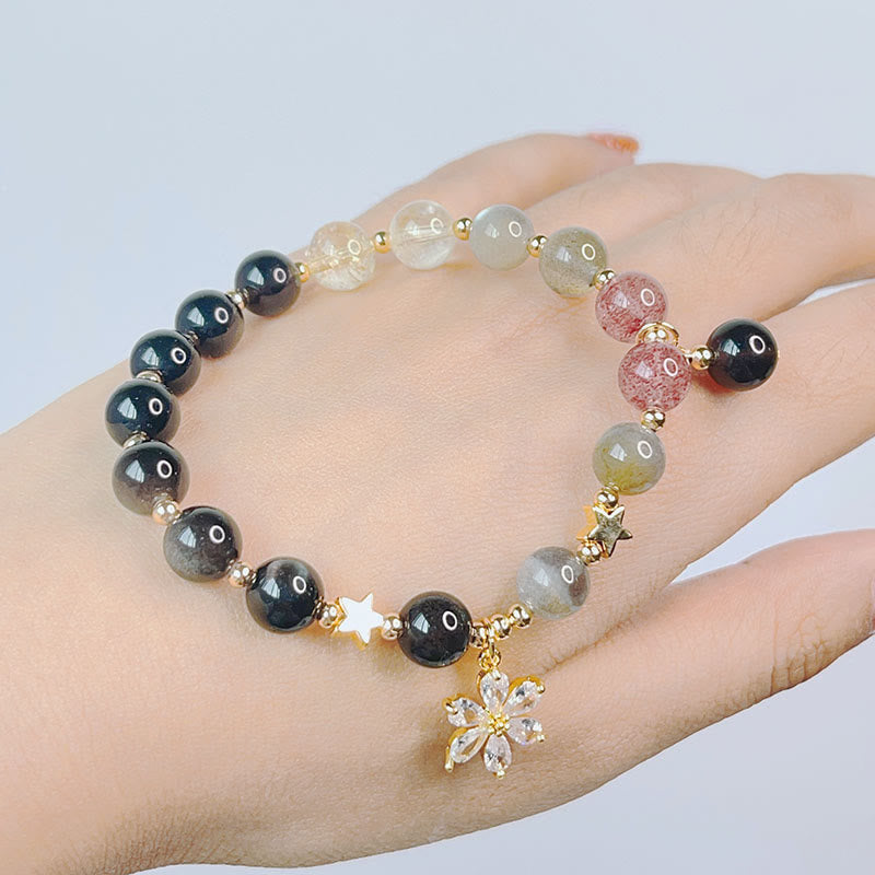 Obsidian Armband Silber Stern am Handgelenk mit Natursteinen getragen