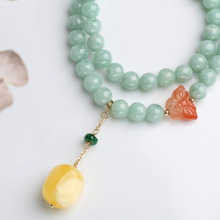 Jade Armband mit Schmetterling Anhänger Glück und Fülle Naturstein