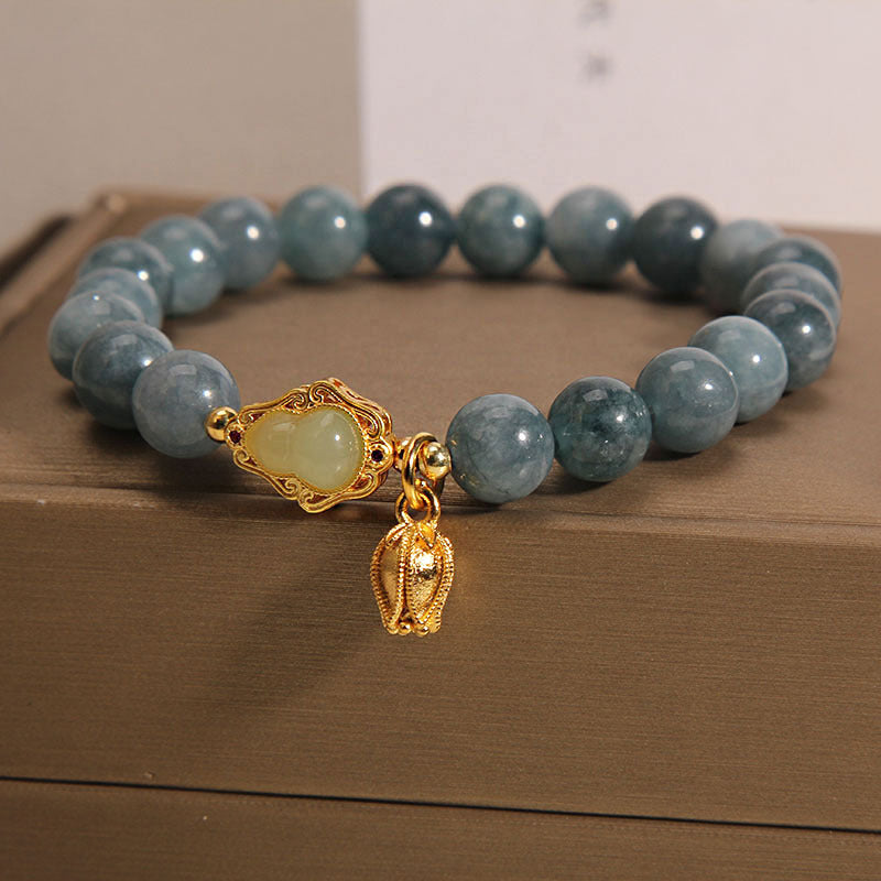 Armband Jade Gourd – Glück mit grauem Stein elastisch getragen