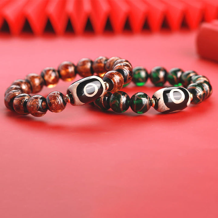 Armband – Wohlstand Balance mit roten und grünen Steinen silberne Perlen