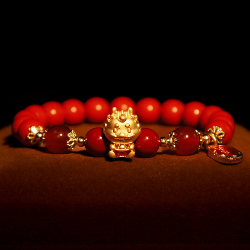 Armband Zinnober Drachen – Schutz rotes Perlenarmband goldener Drachenkopf