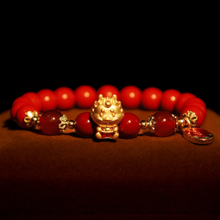 Armband Zinnober Drachen – Schutz rotes Perlenarmband goldener Drachenkopf