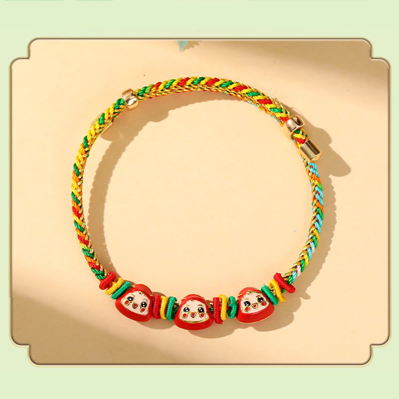 Buntes Zongzi Glück Armband mit Seilgeflecht und roten Perlen.