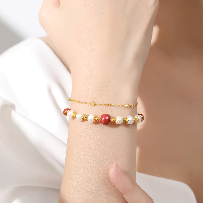 Armband 925 Silber Zinnober Energie rote Perlen Perlmutt golden elegant