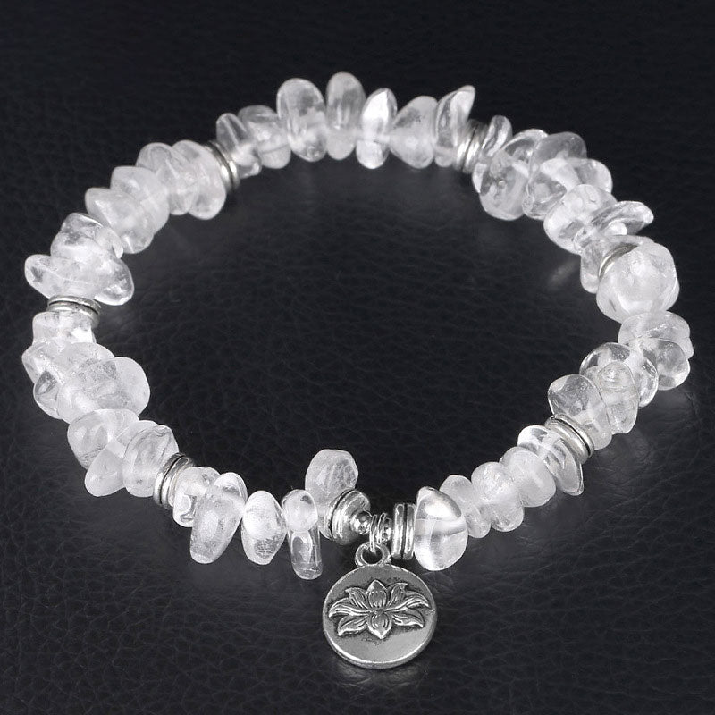 Armband Weißer Kristall Lotus – Heilung mit silbernem Anhänger elastisch