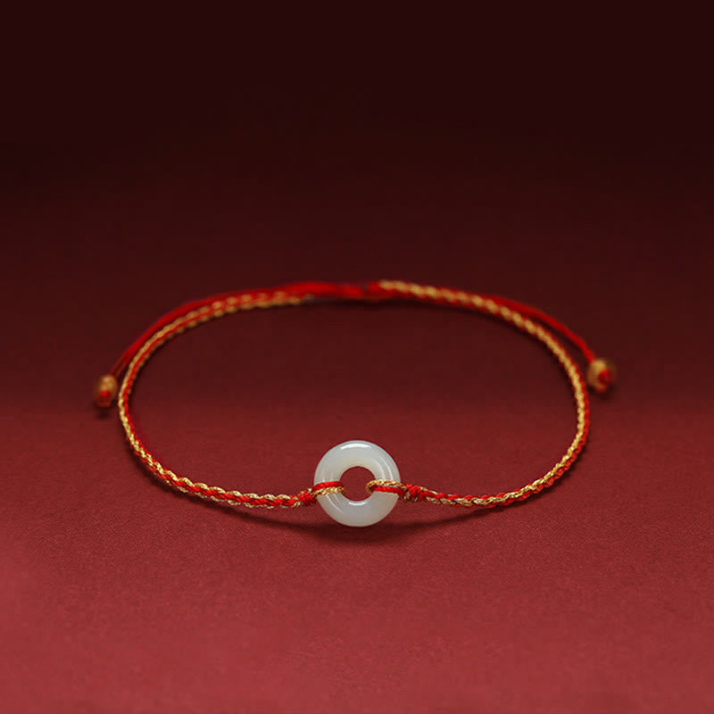 Armband Jade Glück Frieden rotes Seidenband weißer Stein elegant