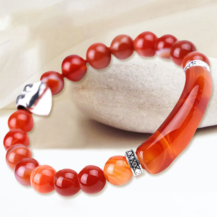 Rotes Kristall Perlen Armband Unisex mit Herz Charm elastisch.