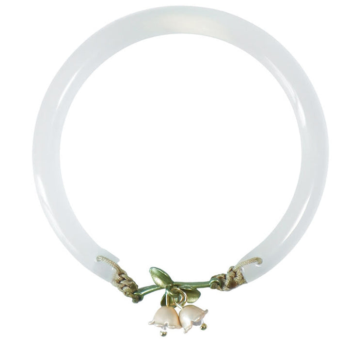 Armband – Stärke & Glück mit weißem Jade Stein und Glockenanhängern