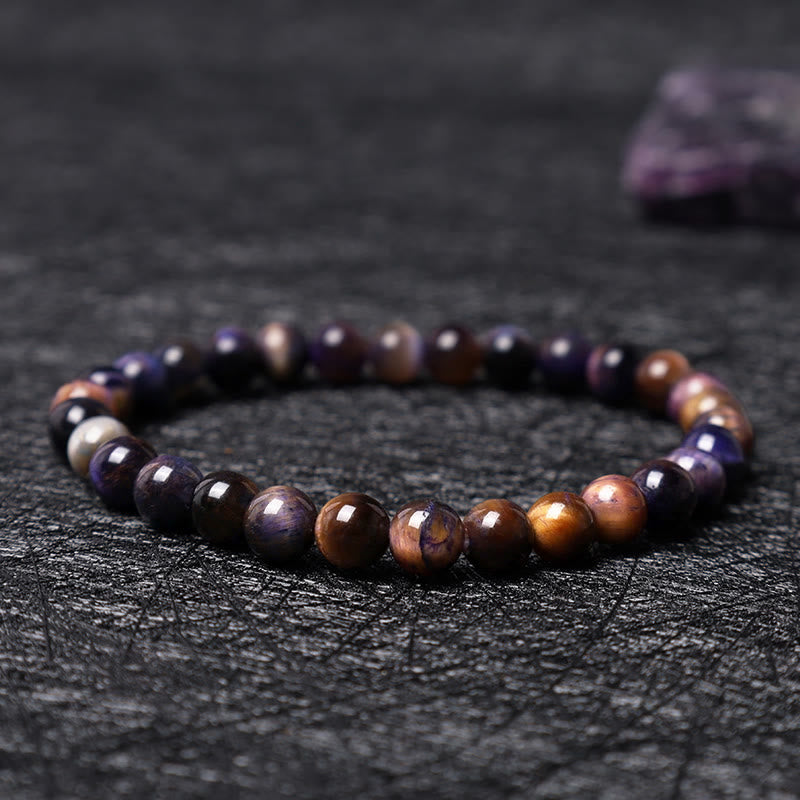 Tigerauge Armband mit braunen und schwarzen Perlen Naturstein elastisch.
