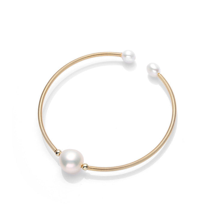 Goldenes Armband mit Perlen Wohlstand elegantes Design flexibel