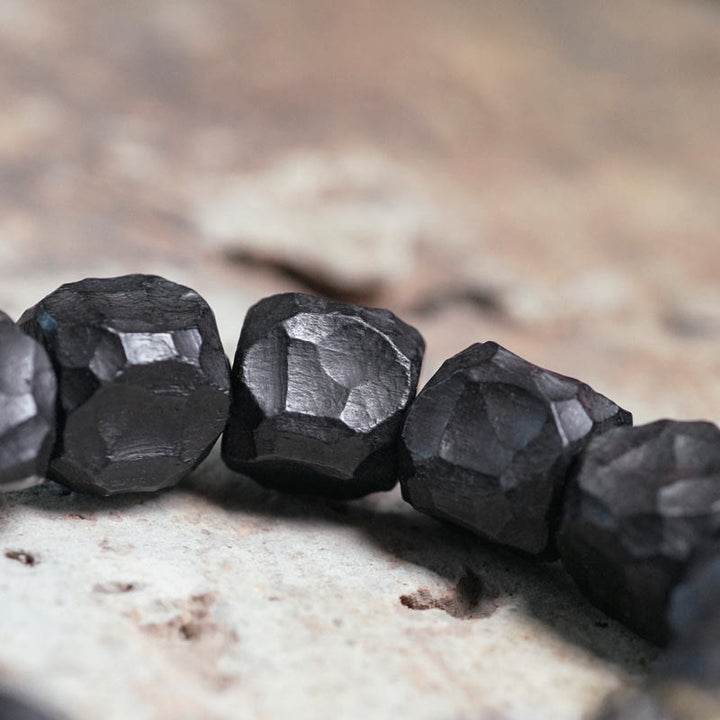 Schwarze facettierte Ebenholz Perlen Mala Kupfer Frieden Naturstein.