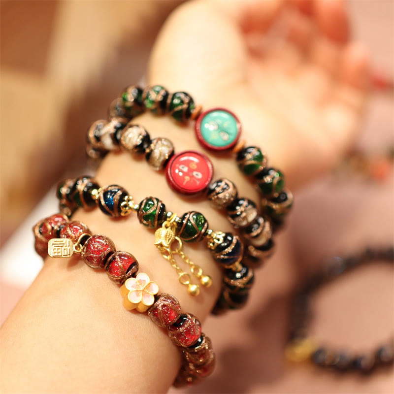 Armband – Wohlstand & Glück mehrfarbige Perlen Naturstein elastisch Handgelenk getragen