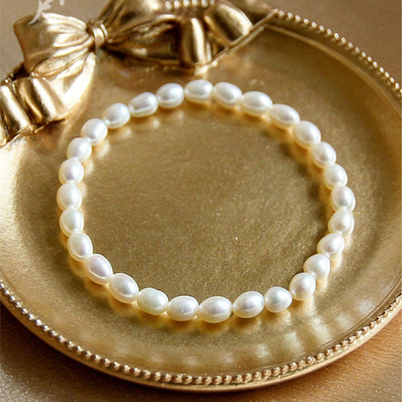 Armband Perle – Heilung Weiße Perlen elegantes Schmuckstück Geschenkbox Gold