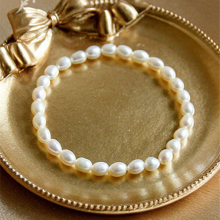 Armband Perle – Heilung Weiße Perlen elegantes Schmuckstück Geschenkbox Gold