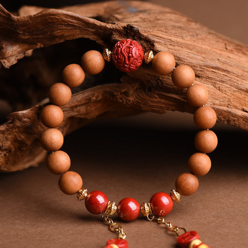 Armband Zinnober Pixiu – Wohlstand mit Holzperlen und roten Steinen