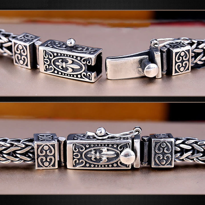 Silbernes Drachen-Armband mit Kettengliedern und Verschluss Detail.