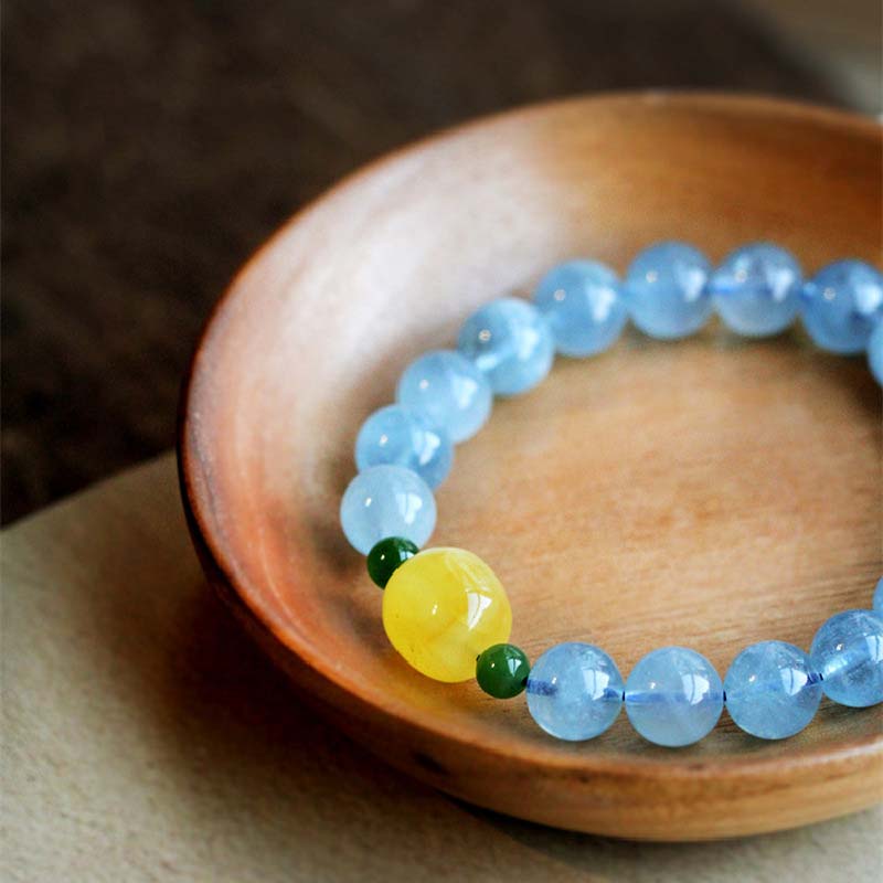 Armband Aquamarin – Heilung & Energie mit gelber Perle und grünen Akzenten