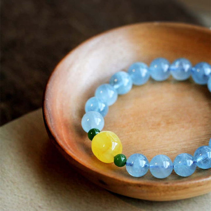 Armband Aquamarin – Heilung & Energie mit gelber Perle und grünen Akzenten