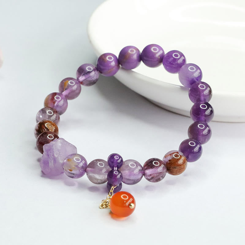 Armband Amethyst Lila Phantom Edelstein mit orangem Anhänger elastisch
