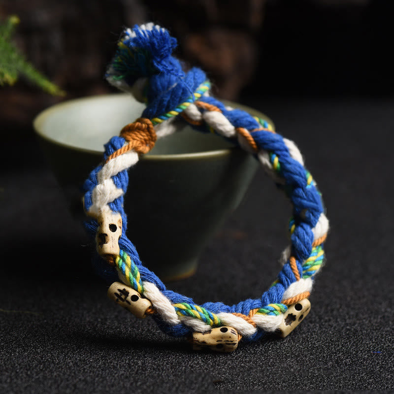 Armband – Glück & Wohlstand & Harmonie mit blauen Schnüren und Perlen.