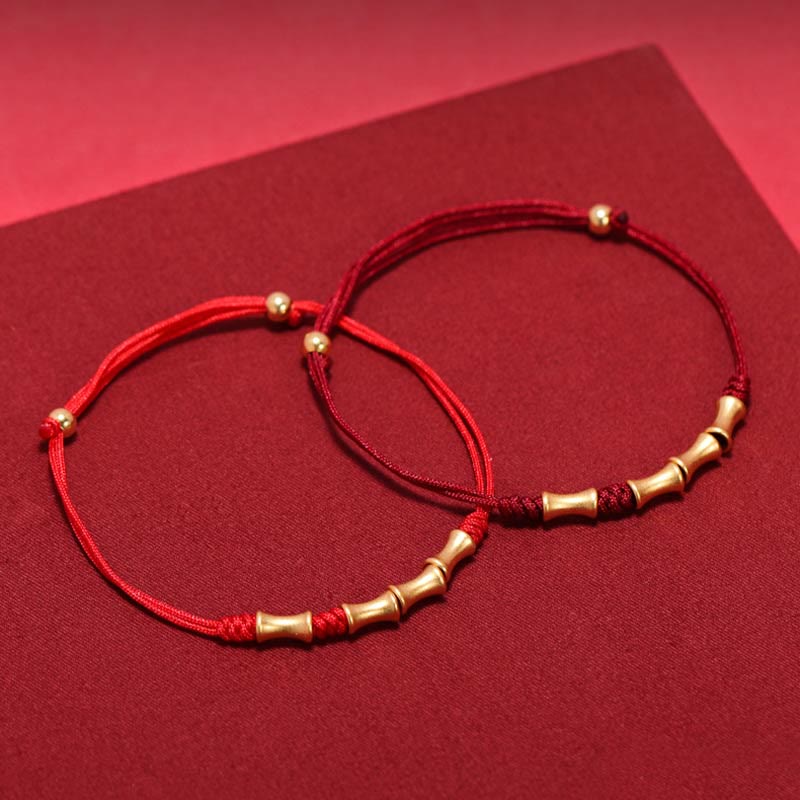 Rote Seidenbänder mit goldenen Bambus-Perlen Armband Glück Schutz elastisch.
