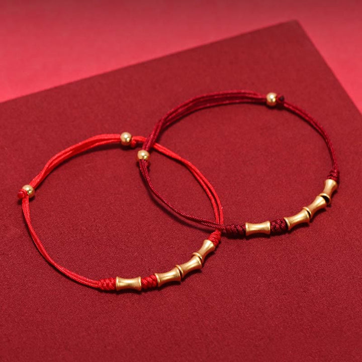 Rote Seidenbänder mit goldenen Bambus-Perlen Armband Glück Schutz elastisch.