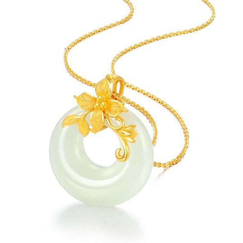 Jade Kette mit goldener Blüte Anhänger zartes Grün