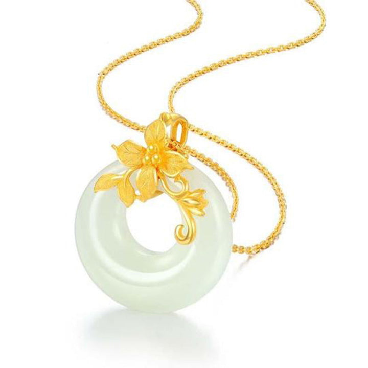 Jade Kette mit goldener Blüte Anhänger zartes Grün