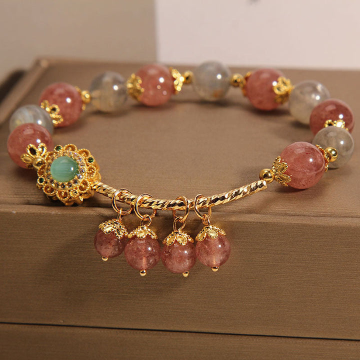 Armband Erdbeerquarz Mondstein gold Perlen elegant Heilstein Schmuck