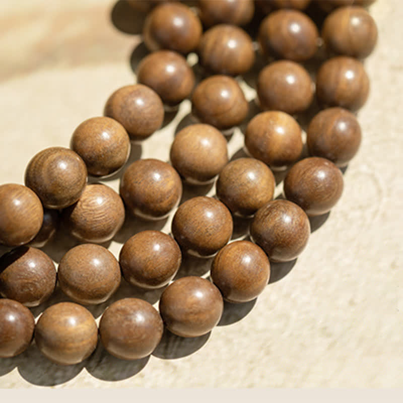 Armband Sandelholz – Frieden braune Holzperlen Naturstein elastisch Schnur