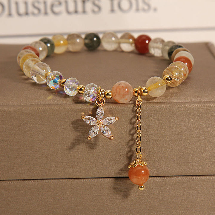Armband Bunt Rutilquarz Glück Zircon mit goldenem Blütenanhänger elegant.