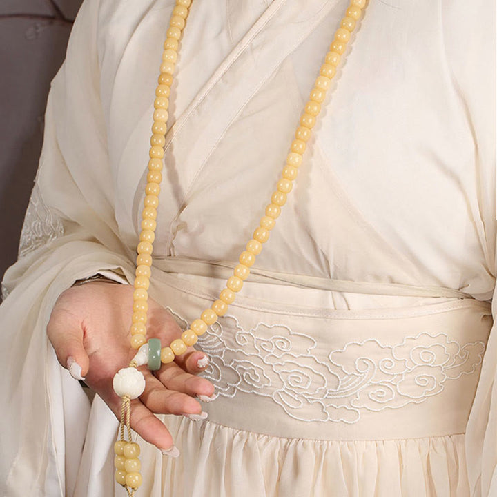 Bodhi Lotus Armband Frieden Harmonie elfenbeinfarben Perlen Hand getragen