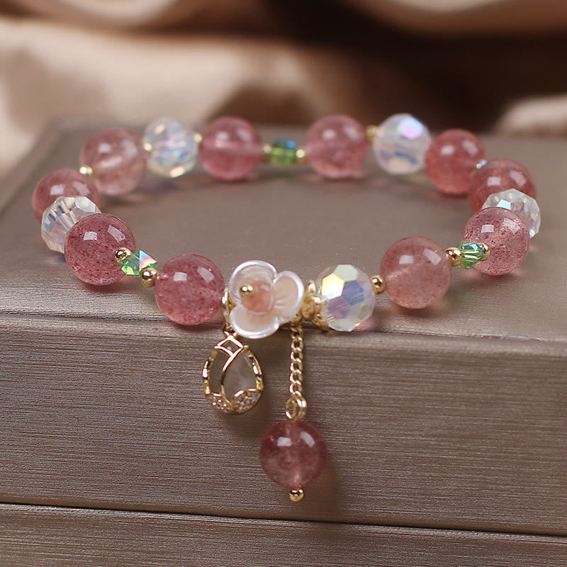 Armband Erdbeerquarz Fluorit – Heilung rosafarbene Perlen Blütenanhänger elegant