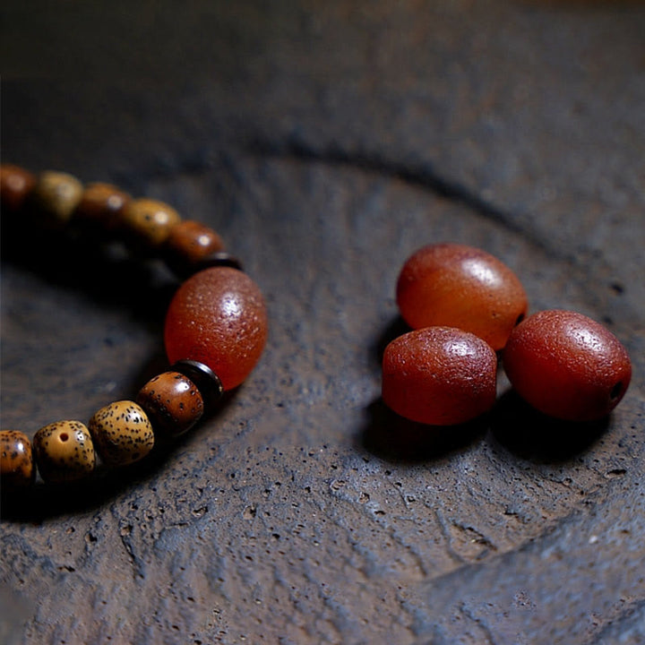 Bodhi Armband Achat Perlen Wohlstand rote Natursteine dunkel