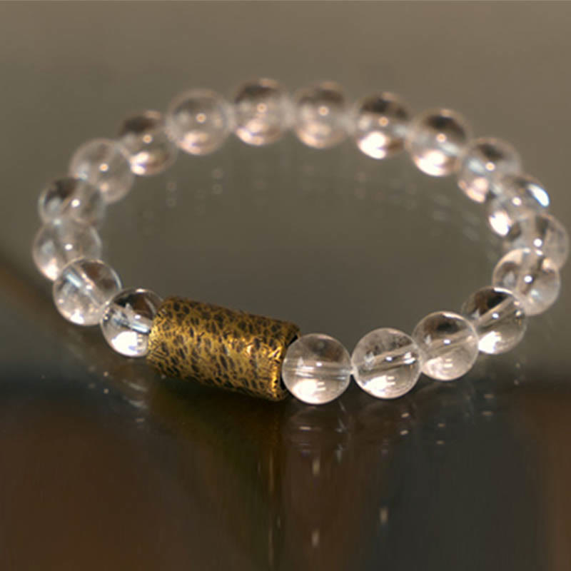 Armband Weißer Kristall – Schutz mit goldenem Textil-Element elastisch getragen
