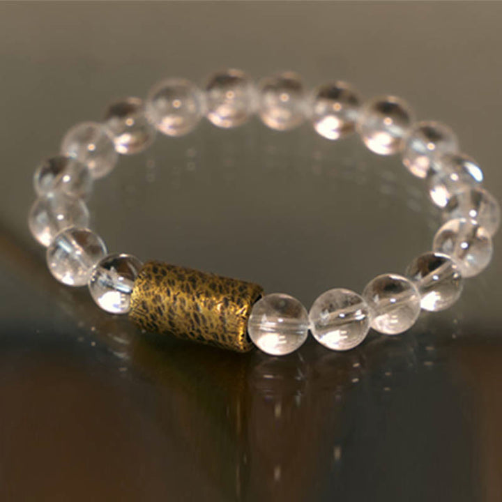 Armband Weißer Kristall – Schutz mit goldenem Textil-Element elastisch getragen