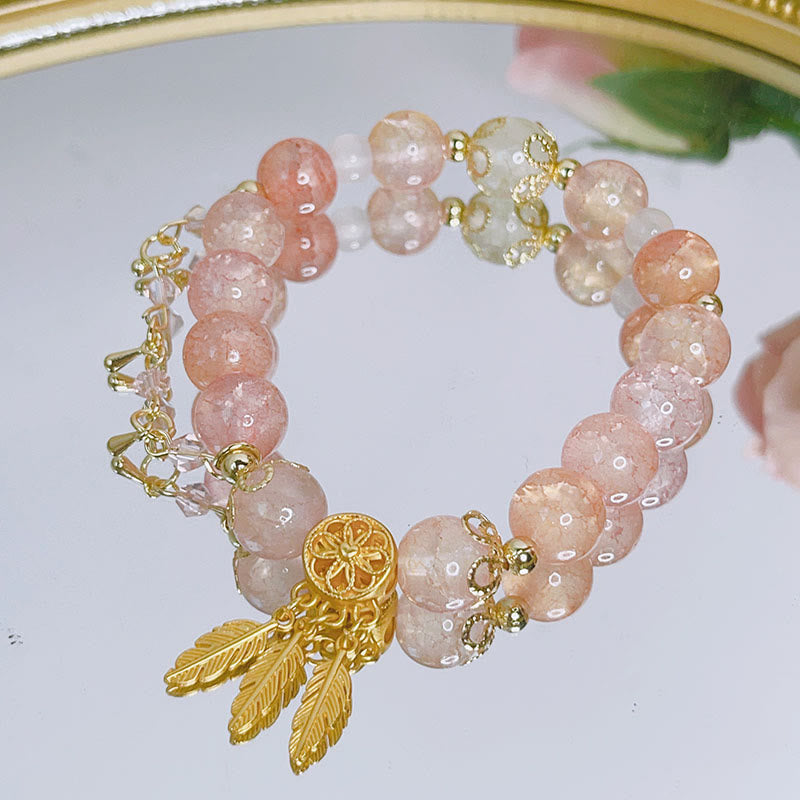 Roségold Perlenarmband mit goldenen Blattanhängern, zartem Design
