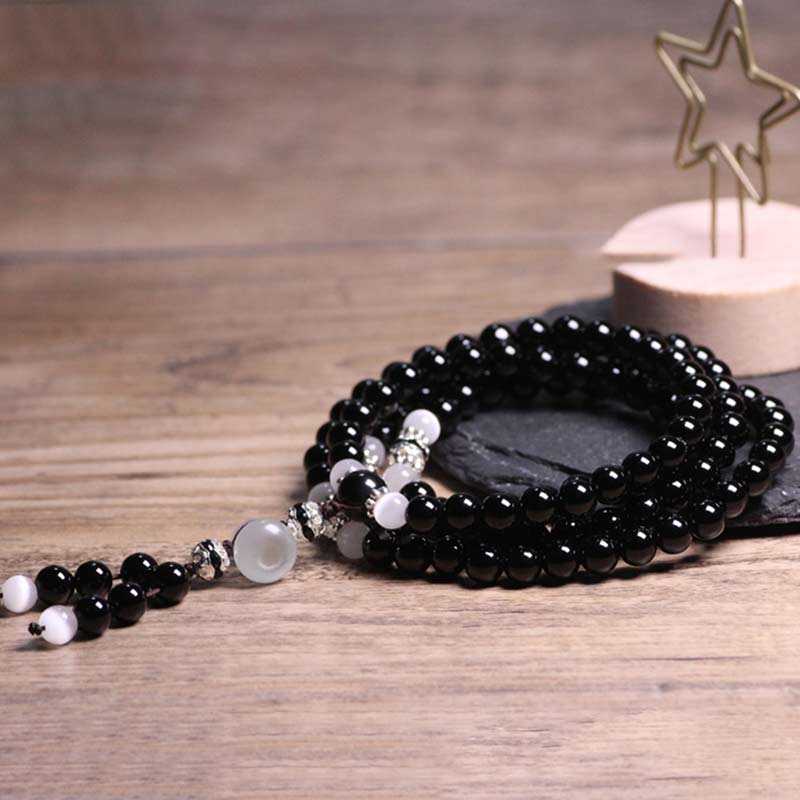 Armband Weißer Kristall Schwarzer Onyx elegantes Perlenarmband Naturstein