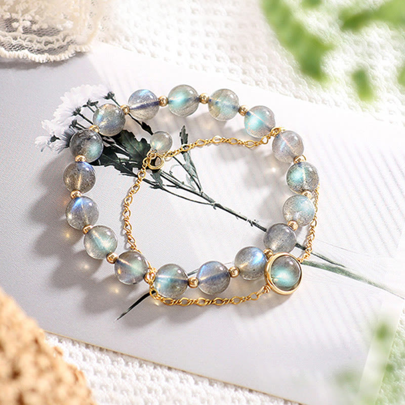 Mondstein Armband mit goldenen Perlen und Blüten elegantes Design.
