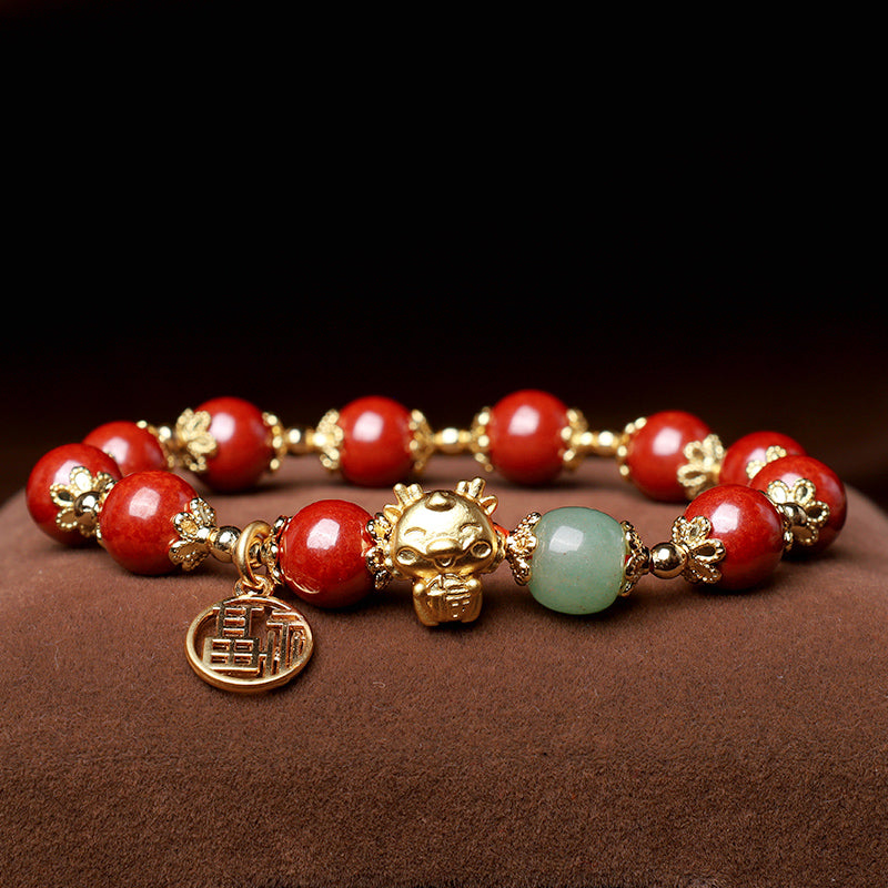 Rotes Armband mit goldenen Perlen und Jade Anhänger elegant