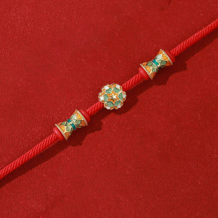 Rotes Armband 925 Silber Lotus mit grünen Steinen elegant.
