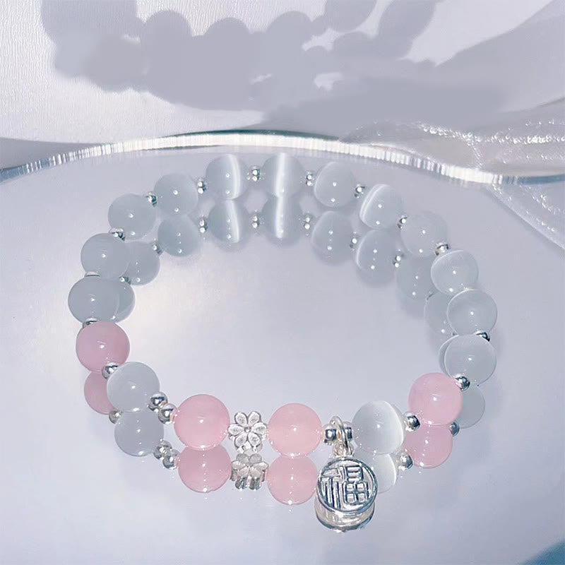 Armband Kristall Pfirsichblüte grau rosa Perlen Silber elegant Schmuck