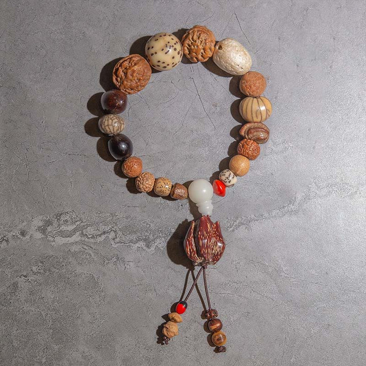 Mala Bodhi Armband aus Naturholzperlen mit roten Akzenten Glück Wohlstand