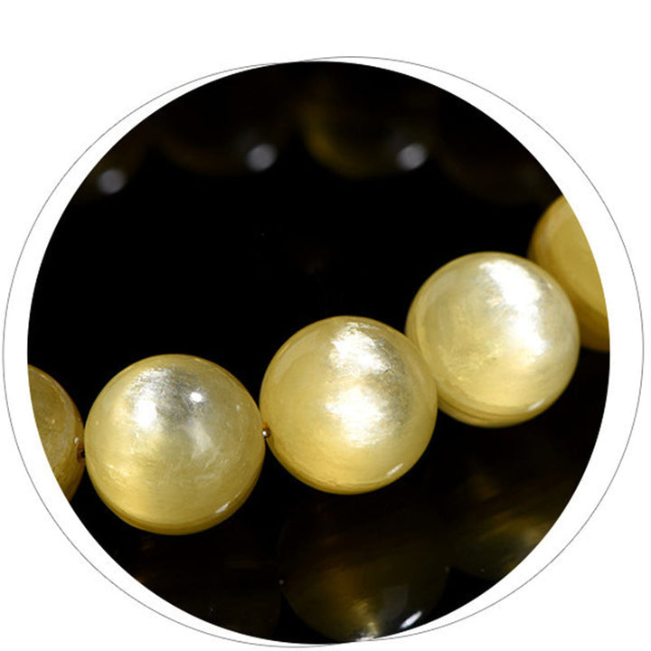 Armband – Schutz & Wohlstand & Harmonie mit goldenen Perlen Naturstein elastisch.