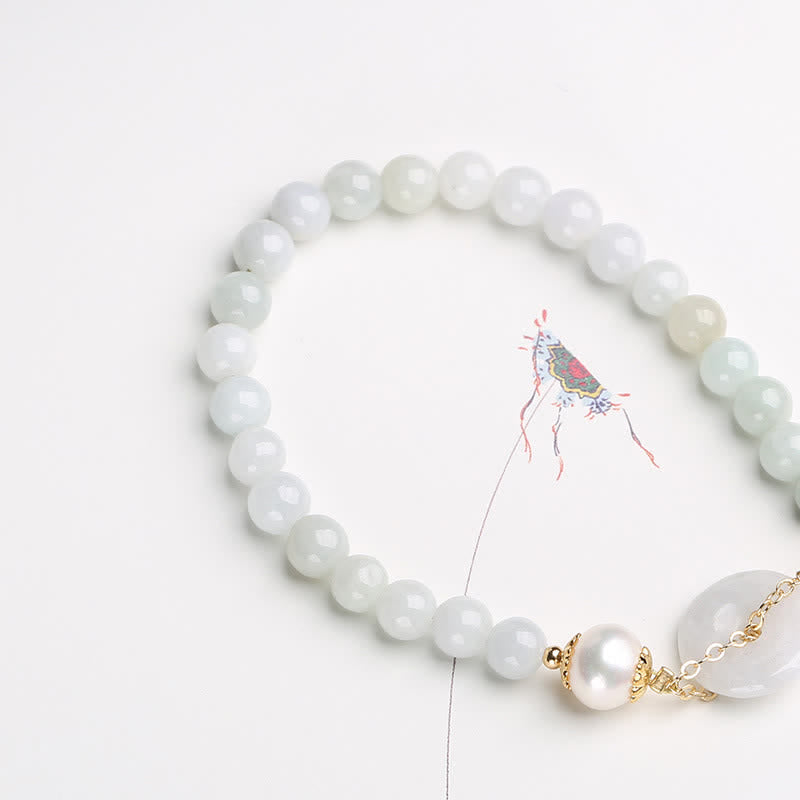 Armband Perle Jade – Glück & Frieden weiße Perlen goldene Verschlüsse elegant