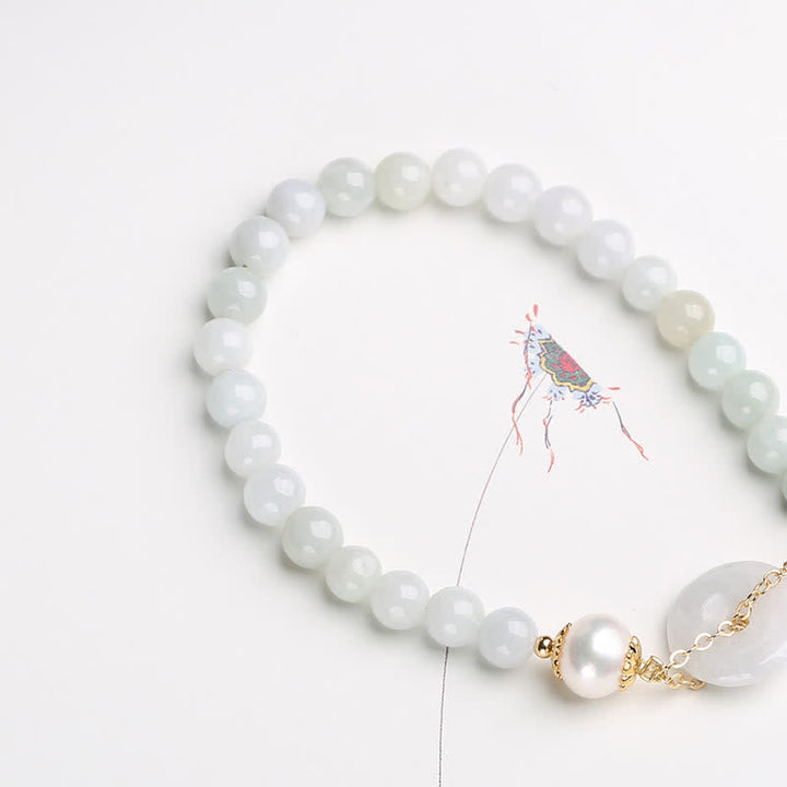 Armband Perle Jade – Glück & Frieden weiße Perlen goldene Verschlüsse elegant