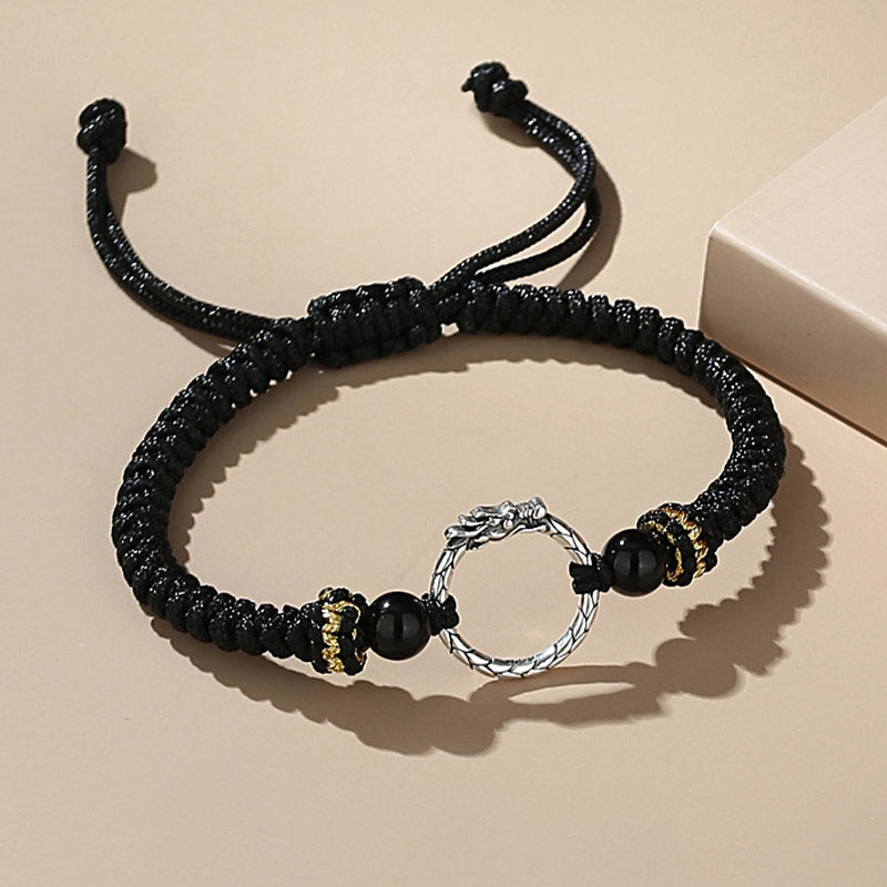Schwarzes Armband mit Phönix Charm und Obsidian Perlen elegantes Design