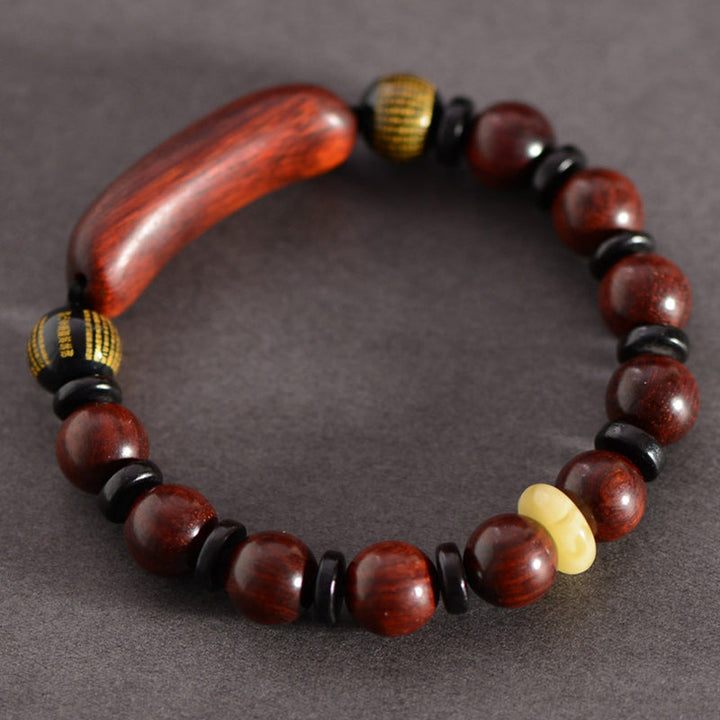 Sandelholz Armband mit roten Perlen und schwarzen Ringen elegantes Design