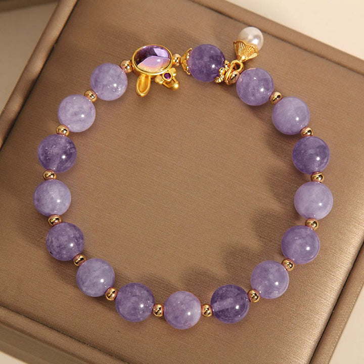 Armband Lila Amethyst Quarz Perlen Gold Verschluss elegant